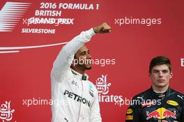 Race winner Lewis Hamilton (GBR) Mercedes AMG F1 celebrates on the podium with Max Verstappen (NLD) Red Bull Racing. 10.07.2016. Formula 1 World Championship, Rd 10, British Grand Prix, Silverstone, England, Race Day.