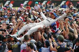 Race winner Lewis Hamilton (GBR) Mercedes AMG F1 celebrates with the fans. 10.07.2016. Formula 1 World Championship, Rd 10, British Grand Prix, Silverstone, England, Race Day.