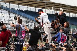 Race winner Lewis Hamilton (GBR) Mercedes AMG F1 celebrates with the fans. 10.07.2016. Formula 1 World Championship, Rd 10, British Grand Prix, Silverstone, England, Race Day.