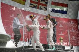 Race winner Lewis Hamilton (GBR) Mercedes AMG F1 celebrates on the podium. 10.07.2016. Formula 1 World Championship, Rd 10, British Grand Prix, Silverstone, England, Race Day.