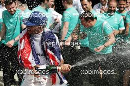 Race winner Lewis Hamilton (GBR) Mercedes AMG F1 celebrates with the team. 10.07.2016. Formula 1 World Championship, Rd 10, British Grand Prix, Silverstone, England, Race Day.