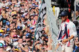 Race winner Lewis Hamilton (GBR) Mercedes AMG F1 celebrates with the fans. 10.07.2016. Formula 1 World Championship, Rd 10, British Grand Prix, Silverstone, England, Race Day.