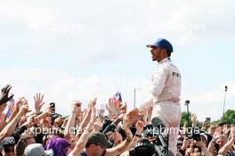 Race winner Lewis Hamilton (GBR) Mercedes AMG F1 celebrates with the fans. 10.07.2016. Formula 1 World Championship, Rd 10, British Grand Prix, Silverstone, England, Race Day.