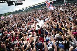 Race winner Lewis Hamilton (GBR) Mercedes AMG F1 celebrates with the fans. 10.07.2016. Formula 1 World Championship, Rd 10, British Grand Prix, Silverstone, England, Race Day.