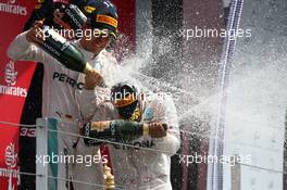 1st place Lewis Hamilton (GBR) Mercedes AMG F1 W07  and 2nd place Nico Rosberg (GER) Mercedes AMG Petronas F1 W07. 10.07.2016. Formula 1 World Championship, Rd 10, British Grand Prix, Silverstone, England, Race Day.