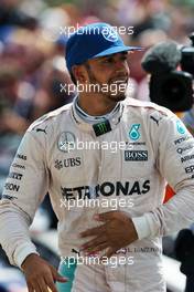 Race winner Lewis Hamilton (GBR) Mercedes AMG F1 celebrates in parc ferme. 10.07.2016. Formula 1 World Championship, Rd 10, British Grand Prix, Silverstone, England, Race Day.