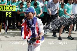 Race winner Lewis Hamilton (GBR) Mercedes AMG F1 celebrates with the team. 10.07.2016. Formula 1 World Championship, Rd 10, British Grand Prix, Silverstone, England, Race Day.