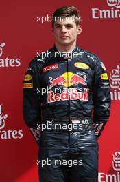 Max Verstappen (NLD) Red Bull Racing on the podium. 10.07.2016. Formula 1 World Championship, Rd 10, British Grand Prix, Silverstone, England, Race Day.