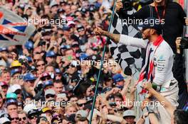 Race winner Lewis Hamilton (GBR) Mercedes AMG F1 celebrates with the fans. 10.07.2016. Formula 1 World Championship, Rd 10, British Grand Prix, Silverstone, England, Race Day.