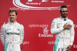 The podium (L to R): Nico Rosberg (GER) Mercedes AMG F1 with team mate Lewis Hamilton (GBR) Mercedes AMG F1. 10.07.2016. Formula 1 World Championship, Rd 10, British Grand Prix, Silverstone, England, Race Day.