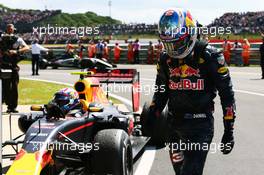 Daniel Ricciardo (AUS) Red Bull Racing with team mate Max Verstappen (NLD) Red Bull Racing RB12 in parc ferme. 10.07.2016. Formula 1 World Championship, Rd 10, British Grand Prix, Silverstone, England, Race Day.