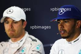 Lewis Hamilton (GBR) Mercedes AMG F1 and team mate Nico Rosberg (GER) Mercedes AMG F1 in the FIA Press Conference. 10.07.2016. Formula 1 World Championship, Rd 10, British Grand Prix, Silverstone, England, Race Day.