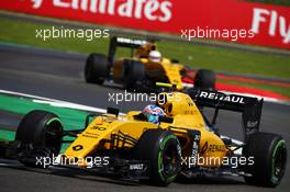 Jolyon Palmer (GBR) Renault Sport F1 Team RS16 leads team mate Kevin Magnussen (DEN) Renault Sport F1 Team RS16. 10.07.2016. Formula 1 World Championship, Rd 10, British Grand Prix, Silverstone, England, Race Day.