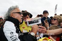 Dr. Vijay Mallya (IND) Sahara Force India F1 Team Owner signs autographs for the fans at the Sahara Force India F1 Team Fan Zone at Woodlands Campsite. 09.07.2016. Formula 1 World Championship, Rd 10, British Grand Prix, Silverstone, England, Qualifying Day.