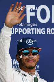 Lewis Hamilton (GBR) Mercedes AMG F1 celebrates his pole position in parc ferme. 09.07.2016. Formula 1 World Championship, Rd 10, British Grand Prix, Silverstone, England, Qualifying Day.