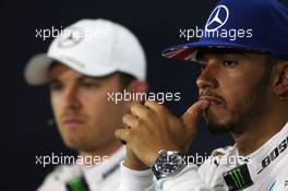 Lewis Hamilton (GBR) Mercedes AMG F1 and team mate Nico Rosberg (GER) Mercedes AMG F1 in the FIA Press Conference. 09.07.2016. Formula 1 World Championship, Rd 10, British Grand Prix, Silverstone, England, Qualifying Day.