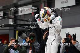 Lewis Hamilton (GBR) Mercedes AMG F1 celebrates his pole position in parc ferme. 09.07.2016. Formula 1 World Championship, Rd 10, British Grand Prix, Silverstone, England, Qualifying Day.