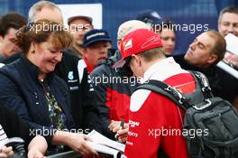 Kimi Raikkonen (FIN) Ferrari signs autographs for the fans. 09.07.2016. Formula 1 World Championship, Rd 10, British Grand Prix, Silverstone, England, Qualifying Day.