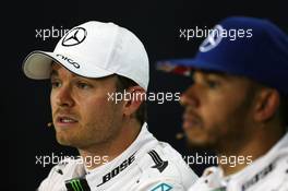 Nico Rosberg (GER) Mercedes AMG F1 and team mate Lewis Hamilton (GBR) Mercedes AMG F1 in the FIA Press Conference. 09.07.2016. Formula 1 World Championship, Rd 10, British Grand Prix, Silverstone, England, Qualifying Day.