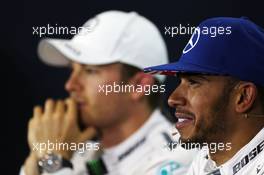 Lewis Hamilton (GBR) Mercedes AMG F1 and team mate Nico Rosberg (GER) Mercedes AMG F1 in the FIA Press Conference. 09.07.2016. Formula 1 World Championship, Rd 10, British Grand Prix, Silverstone, England, Qualifying Day.