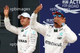 Nico Rosberg (GER) Mercedes AMG Petronas F1 W07 and Lewis Hamilton (GBR) Mercedes AMG F1 W07 . 09.07.2016. Formula 1 World Championship, Rd 10, British Grand Prix, Silverstone, England, Qualifying Day.