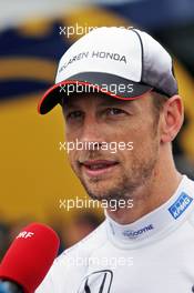 Jenson Button (GBR) McLaren with the media. 09.07.2016. Formula 1 World Championship, Rd 10, British Grand Prix, Silverstone, England, Qualifying Day.