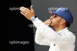 Lewis Hamilton (GBR) Mercedes AMG F1 celebrates his pole position in parc ferme. 09.07.2016. Formula 1 World Championship, Rd 10, British Grand Prix, Silverstone, England, Qualifying Day.