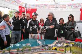 Dr. Vijay Mallya (IND) Sahara Force India F1 Team Owner and Sergio Perez (MEX) Sahara Force India F1 play Scalextric at the Sahara Force India F1 Team Fan Zone at Woodlands Campsite. 09.07.2016. Formula 1 World Championship, Rd 10, British Grand Prix, Silverstone, England, Qualifying Day.