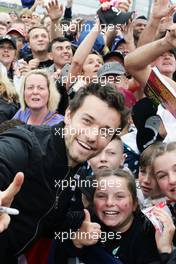 Jolyon Palmer (GBR) Renault Sport F1 Team with fans on the drivers parade. 10.07.2016. Formula 1 World Championship, Rd 10, British Grand Prix, Silverstone, England, Race Day.