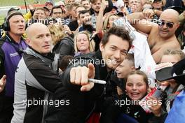 Jolyon Palmer (GBR) Renault Sport F1 Team with fans on the drivers parade. 10.07.2016. Formula 1 World Championship, Rd 10, British Grand Prix, Silverstone, England, Race Day.