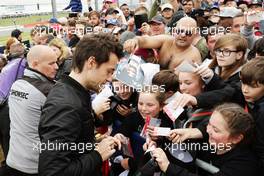 Jolyon Palmer (GBR) Renault Sport F1 Team signs autographs for the fans on the drivers parade. 10.07.2016. Formula 1 World Championship, Rd 10, British Grand Prix, Silverstone, England, Race Day.