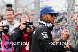 Lewis Hamilton (GBR) Mercedes AMG F1 with fans on the drivers parade. 10.07.2016. Formula 1 World Championship, Rd 10, British Grand Prix, Silverstone, England, Race Day.