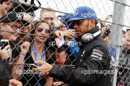 Lewis Hamilton (GBR) Mercedes AMG F1 with fans on the drivers parade. 10.07.2016. Formula 1 World Championship, Rd 10, British Grand Prix, Silverstone, England, Race Day.
