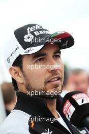 Sergio Perez (MEX) Sahara Force India F1 with the media. 07.07.2016. Formula 1 World Championship, Rd 10, British Grand Prix, Silverstone, England, Preparation Day.