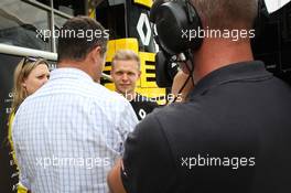 Kevin Magnussen (DEN) Renault Sport F1 Team with the media. 07.07.2016. Formula 1 World Championship, Rd 10, British Grand Prix, Silverstone, England, Preparation Day.
