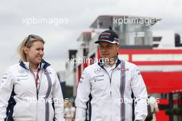 Valtteri Bottas (FIN) Williams with Sophie Eden (GBR) Williams Press Officer. 07.07.2016. Formula 1 World Championship, Rd 10, British Grand Prix, Silverstone, England, Preparation Day.