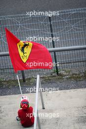 A youn Ferrari fan with a flag. 29.07.2016. Formula 1 World Championship, Rd 12, German Grand Prix, Hockenheim, Germany, Practice Day.