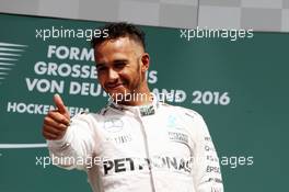 Race winner Lewis Hamilton (GBR) Mercedes AMG F1 celebrates on the podium. 31.07.2016. Formula 1 World Championship, Rd 12, German Grand Prix, Hockenheim, Germany, Race Day.