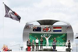 The podium (L to R): Daniel Ricciardo (AUS) Red Bull Racing, second; Lewis Hamilton (GBR) Mercedes AMG F1, race winner; Max Verstappen (NLD) Red Bull Racing, third. 31.07.2016. Formula 1 World Championship, Rd 12, German Grand Prix, Hockenheim, Germany, Race Day.