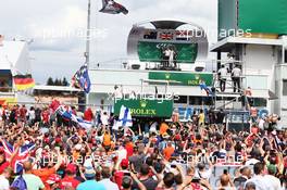 The podium (L to R): Daniel Ricciardo (AUS) Red Bull Racing, second; Lewis Hamilton (GBR) Mercedes AMG F1, race winner; Max Verstappen (NLD) Red Bull Racing, third. 31.07.2016. Formula 1 World Championship, Rd 12, German Grand Prix, Hockenheim, Germany, Race Day.