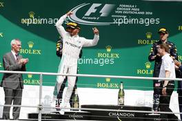 Race winner Lewis Hamilton (GBR) Mercedes AMG F1 celebrates on the podium. 31.07.2016. Formula 1 World Championship, Rd 12, German Grand Prix, Hockenheim, Germany, Race Day.