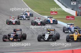 (L to R): Daniil Kvyat (RUS) Scuderia Toro Rosso STR11; Sergio Perez (MEX) Sahara Force India F1 VJM09; and Jolyon Palmer (GBR) Renault Sport F1 Team RS16 at the start of the race. 31.07.2016. Formula 1 World Championship, Rd 12, German Grand Prix, Hockenheim, Germany, Race Day.