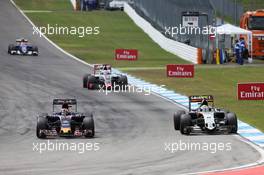 (L to R): Daniil Kvyat (RUS) Scuderia Toro Rosso STR11 and Sergio Perez (MEX) Sahara Force India F1 VJM09 battle for position. 31.07.2016. Formula 1 World Championship, Rd 12, German Grand Prix, Hockenheim, Germany, Race Day.