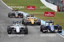 (L to R): Felipe Massa (BRA) Williams FW38 and Marcus Ericsson (SWE) Sauber C35 battle for position. 31.07.2016. Formula 1 World Championship, Rd 12, German Grand Prix, Hockenheim, Germany, Race Day.