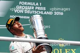 Race winner Lewis Hamilton (GBR) Mercedes AMG F1 celebrates on the podium. 31.07.2016. Formula 1 World Championship, Rd 12, German Grand Prix, Hockenheim, Germany, Race Day.