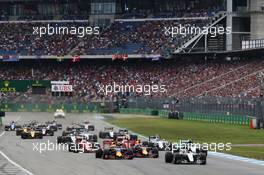 Lewis Hamilton (GBR) Mercedes AMG F1 W07 Hybrid leads at the start of the race. 31.07.2016. Formula 1 World Championship, Rd 12, German Grand Prix, Hockenheim, Germany, Race Day.