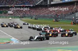 Lewis Hamilton (GBR) Mercedes AMG F1 W07 Hybrid leads at the start of the race. 31.07.2016. Formula 1 World Championship, Rd 12, German Grand Prix, Hockenheim, Germany, Race Day.