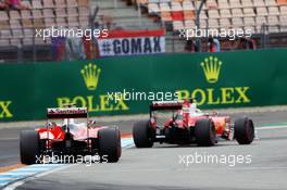Sebastian Vettel (GER) Ferrari SF16-H leads team mate Kimi Raikkonen (FIN) Ferrari SF16-H. 30.07.2016. Formula 1 World Championship, Rd 12, German Grand Prix, Hockenheim, Germany, Qualifying Day.
