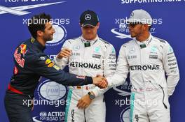 Qualifying top three in parc ferme (L to R): Daniel Ricciardo (AUS) Red Bull Racing, third; Nico Rosberg (GER) Mercedes AMG F1, pole position; Lewis Hamilton (GBR) Mercedes AMG F1, second. 30.07.2016. Formula 1 World Championship, Rd 12, German Grand Prix, Hockenheim, Germany, Qualifying Day.