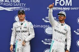 (L to R): Pole sitter Nico Rosberg (GER) Mercedes AMG F1 in parc ferme with team mate Lewis Hamilton (GBR) Mercedes AMG F1. 30.07.2016. Formula 1 World Championship, Rd 12, German Grand Prix, Hockenheim, Germany, Qualifying Day.